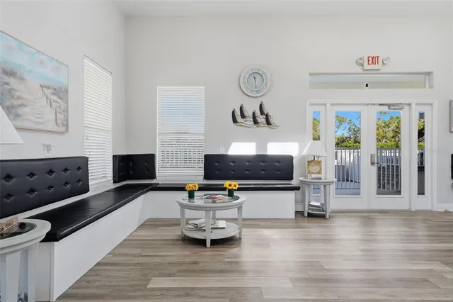 a view of a swimming pool with an outdoor seating