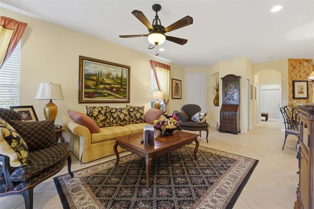 a living room with furniture and a rug