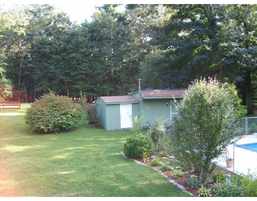 174 Armsby Road Sutton, MA 01590 - Photo 25 of 30 a view of a garden with a house