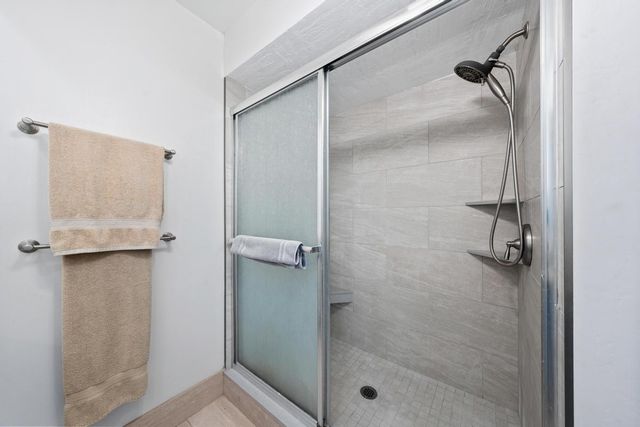 a view of a swimming pool and an ocean view