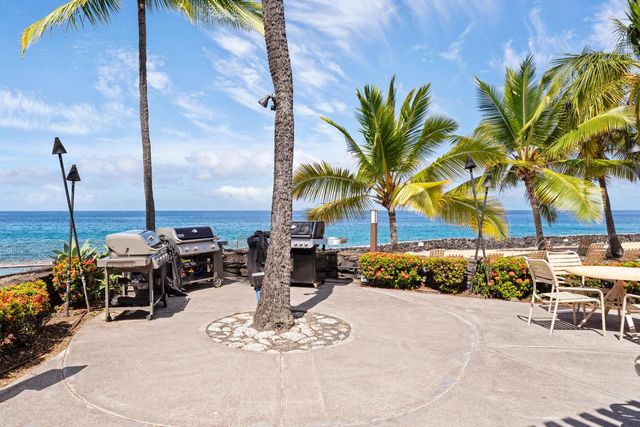 a view of a hallway with washer and dryer