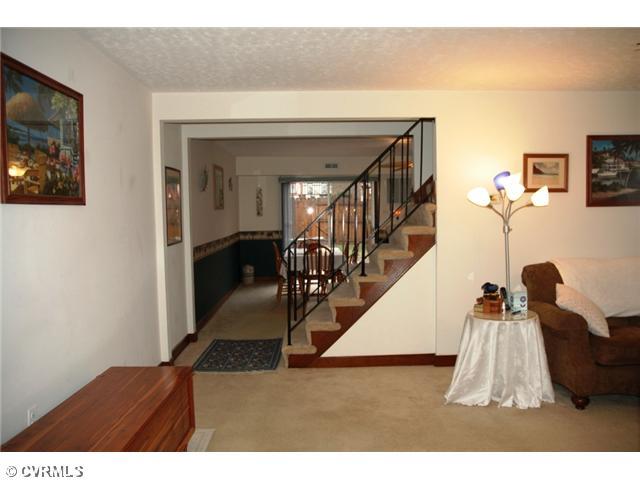 815 Roehampton Court North Chesterfield, VA 23235 - Photo 3 of 14 Living Room - Living Room with brick fireplace and ceiling fan