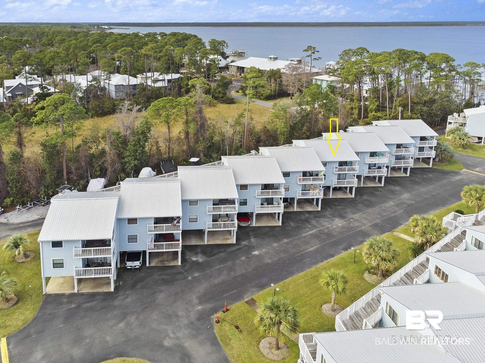 25861 Canal Road, Unit 77 Orange Beach, AL 36561 - Photo 2 of 48 Aerial perspective of suburban area
