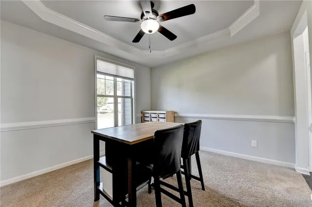 a kitchen with stainless steel appliances granite countertop a sink a stove cabinets and wooden floor