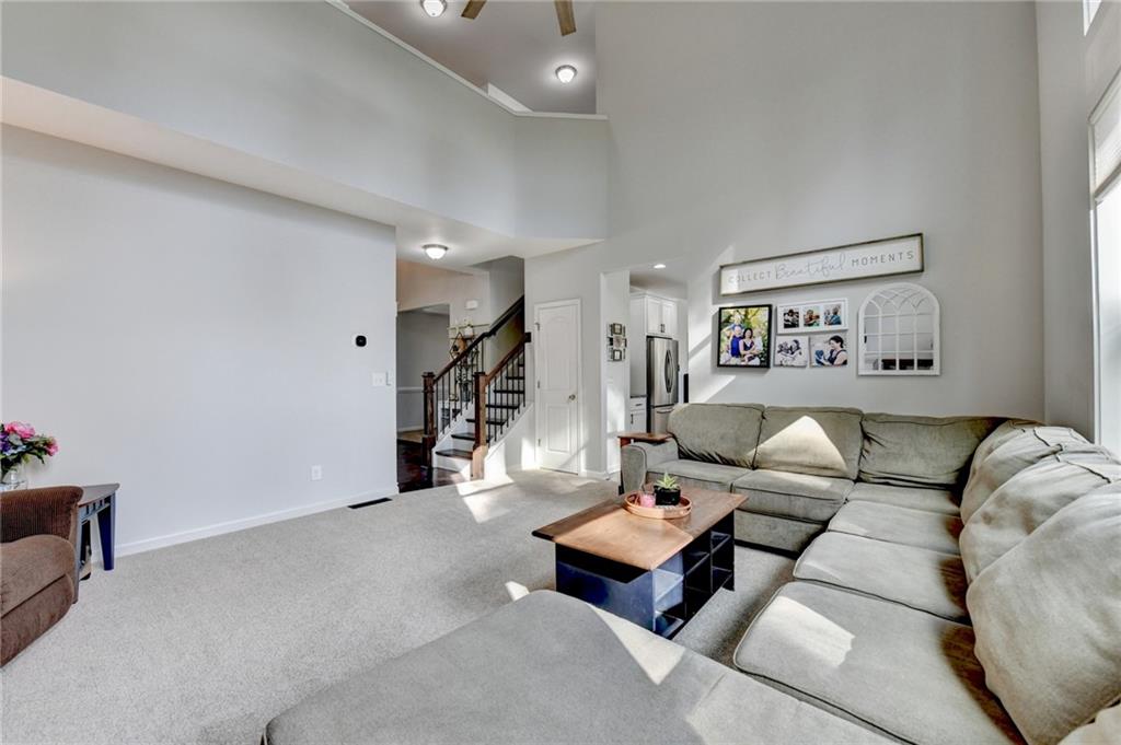 533 Widgeon Way Jefferson, GA 30549 - Photo 20 of 101 a living room with furniture and a couch