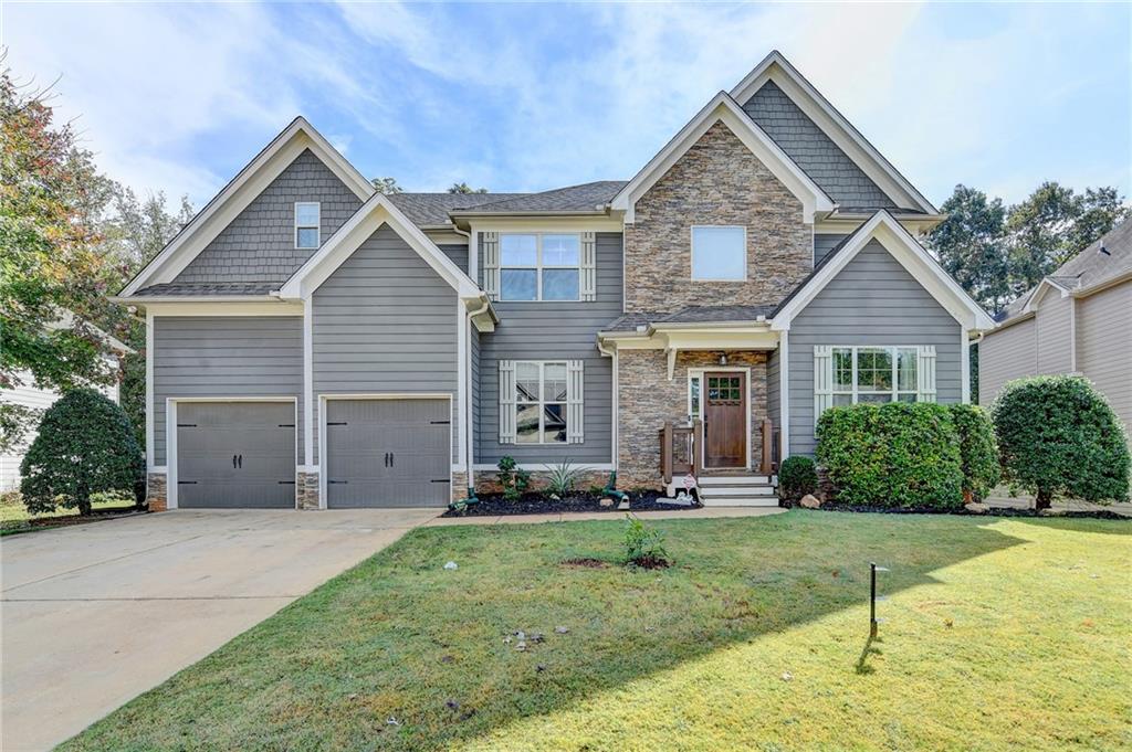 533 Widgeon Way Jefferson, GA 30549 - Photo 2 of 101 a front view of a house with a yard