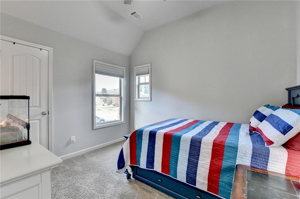 533 Widgeon Way Jefferson, GA 30549 - Photo 50 of 101 a bedroom with a bed and a window