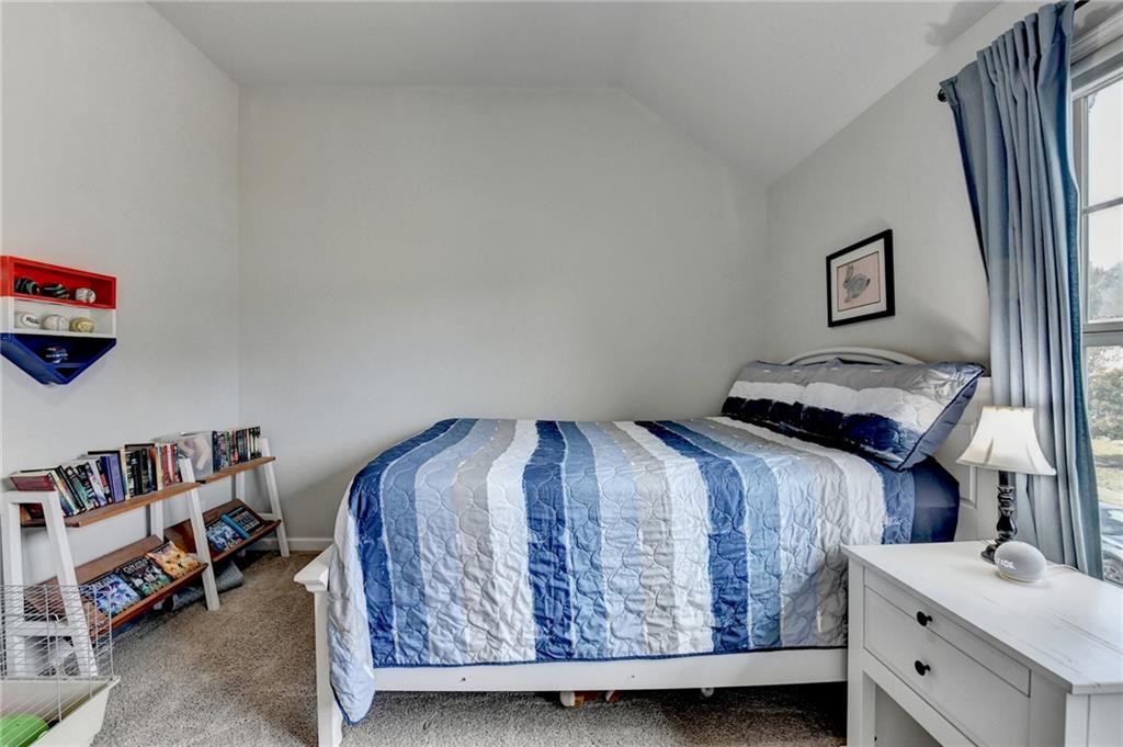 533 Widgeon Way Jefferson, GA 30549 - Photo 62 of 101 a bedroom with a bed and a closet