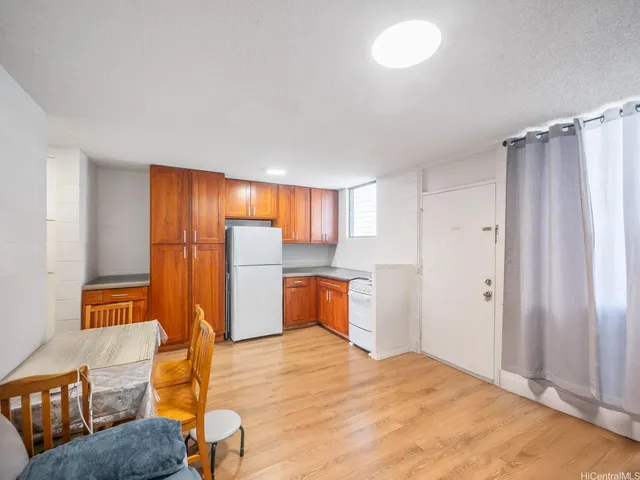 a bedroom with furniture and window
