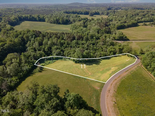 a black and white photo of a refrigerator