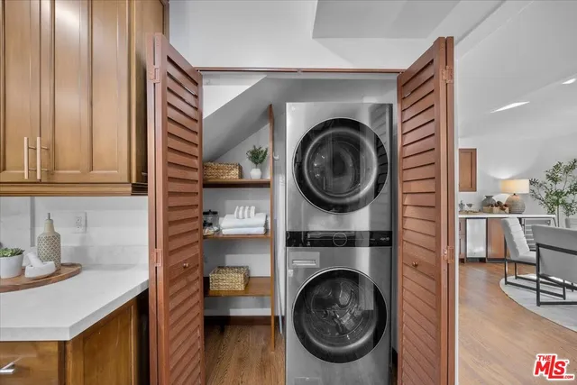a view of livingroom with washer and dryer