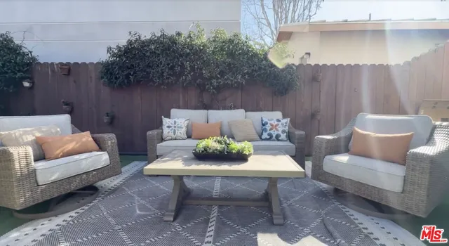 a aerial view of a house with a yard