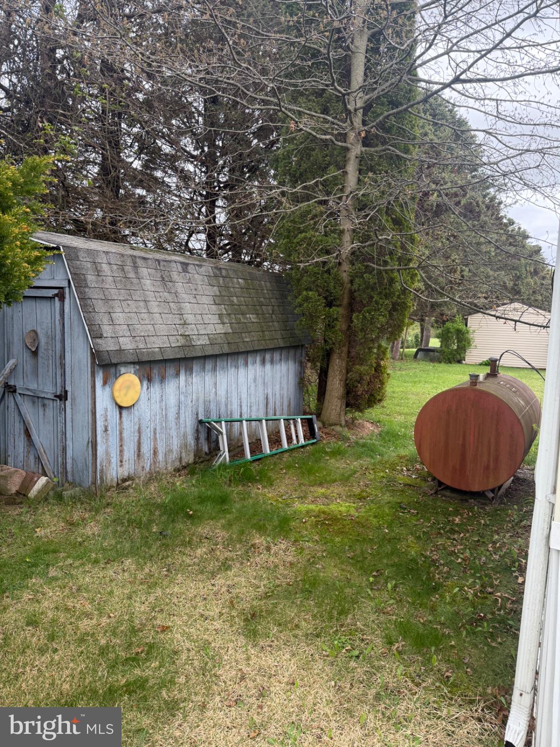 5 Revolutionary Road Mount Bethel, PA 18343 - Photo 26 of 28 Charming shed nestled in green tranquility.
