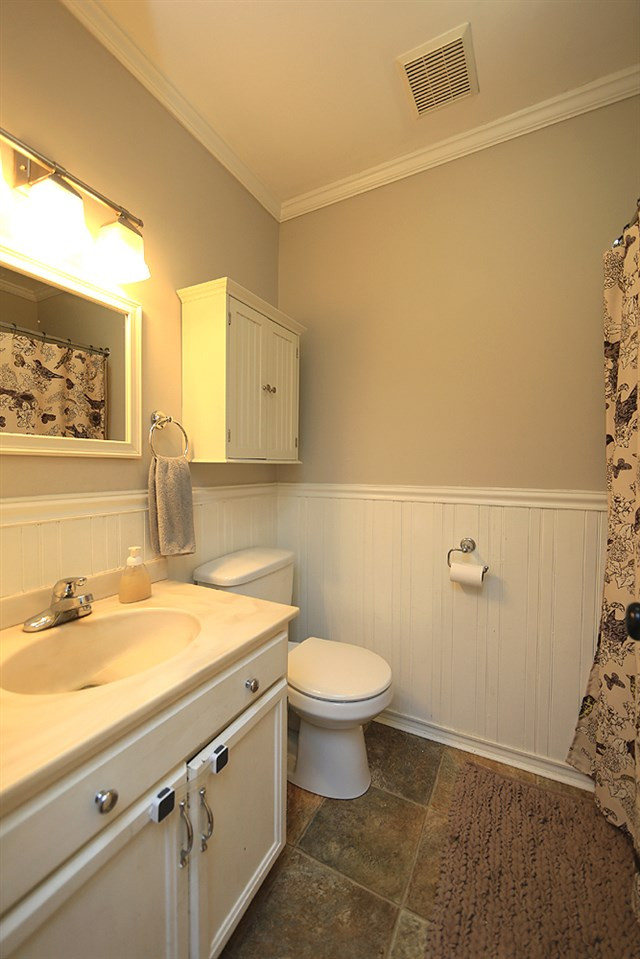 6004 Spring Valley Drive Raleigh, NC 27616 - Photo 13 of 25 Convenient to the 2 secondary bedrooms nearby. Hall Bath