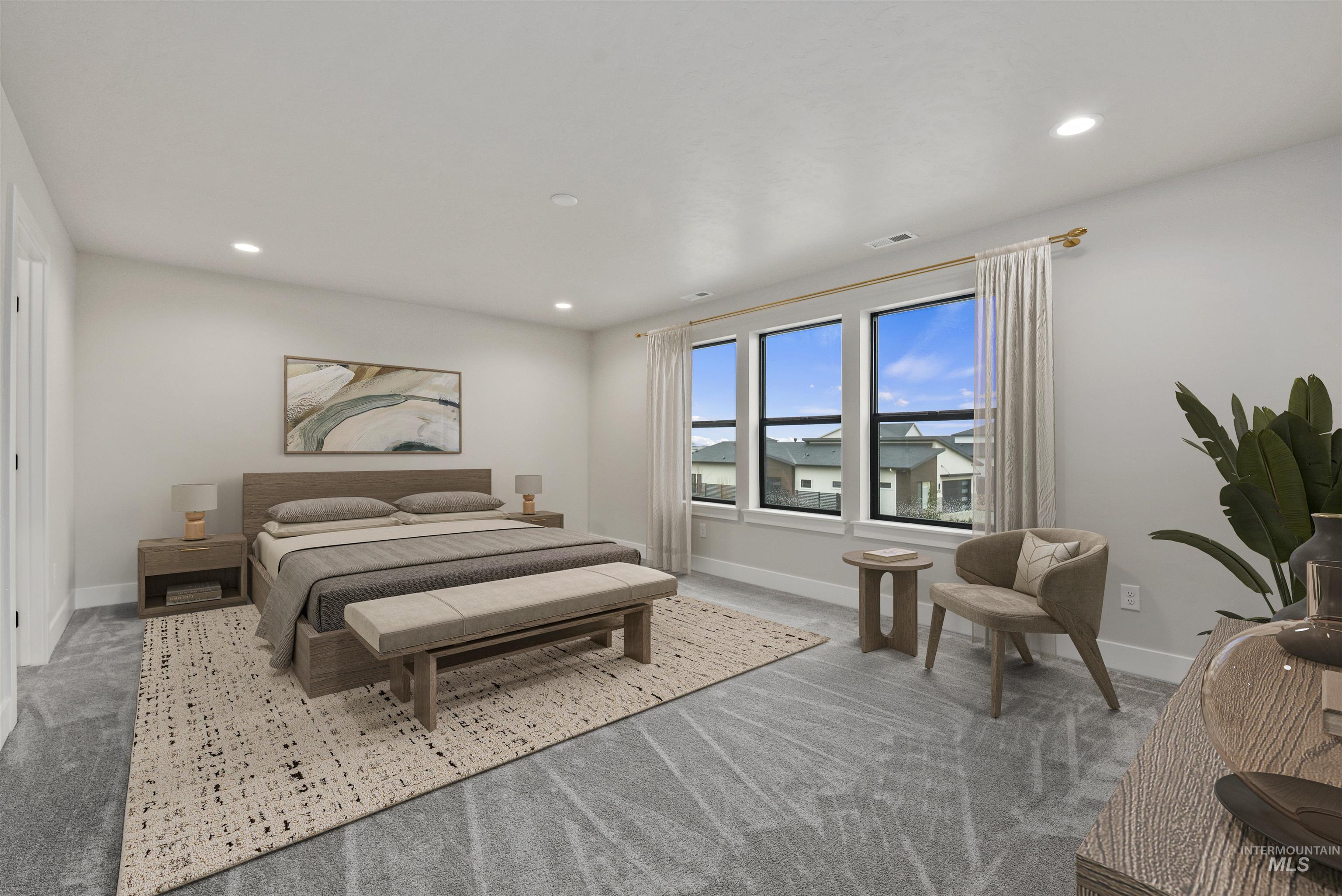7660 West Old School Street, Unit ROUGE Meridian, ID 83646 - Photo 12 of 28 Bedroom with light colored carpet and recessed lighting