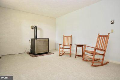 339 Whorton Hollow Road Castleton, VA 22716 - Photo 25 of 38 Family Room with Woodstove