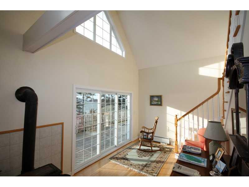10 Pleasant River Road Addison, ME 04606 - Photo 14 of 35 Living Room. Wood Stove provides...