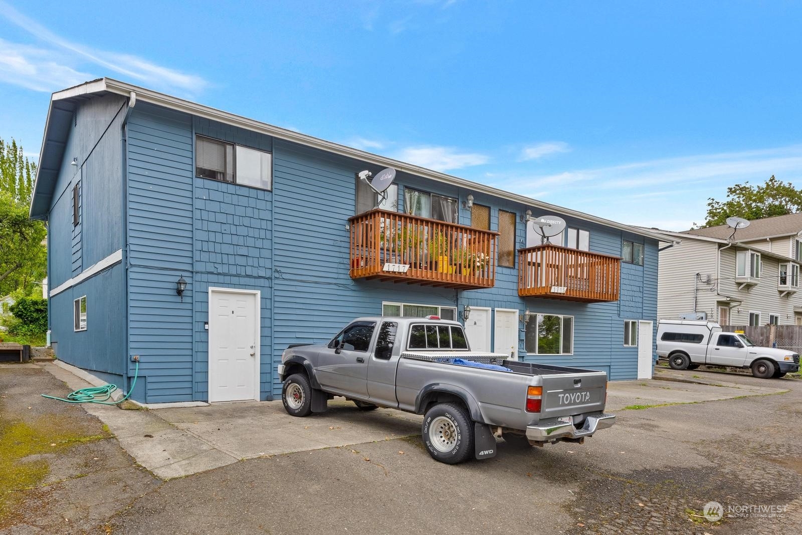 1715 16th Avenue South Seattle, WA 98144 - Photo 1 of 38 a car parked in front of a house