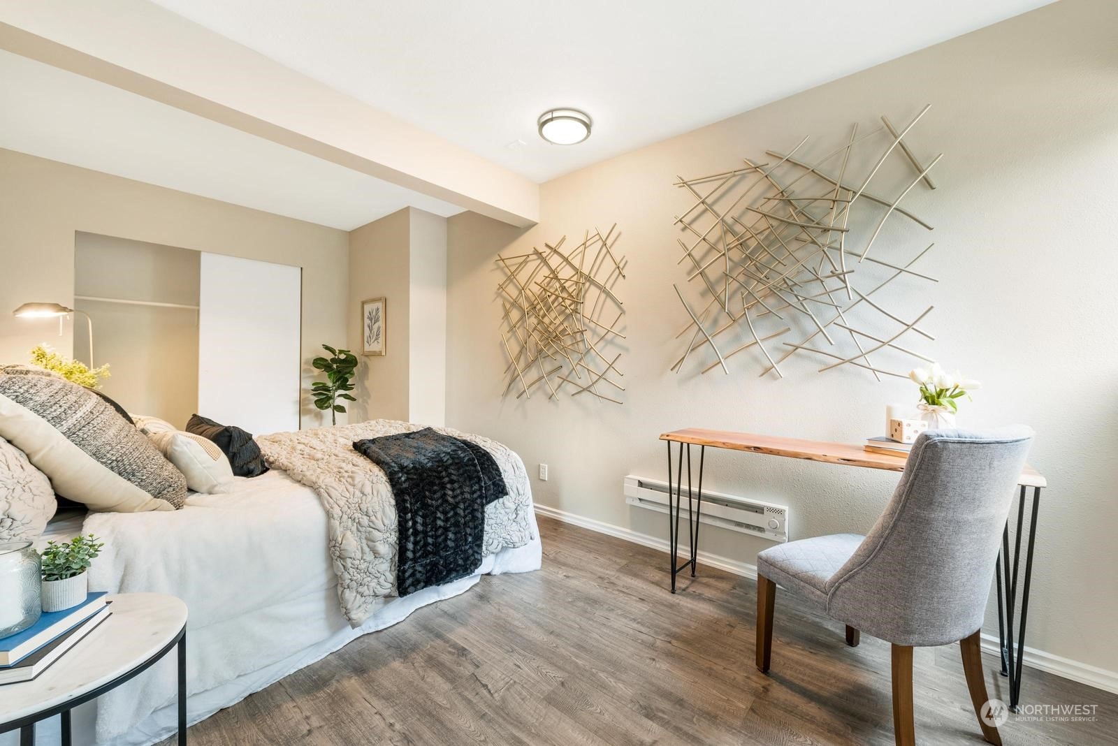 1715 16th Avenue South Seattle, WA 98144 - Photo 12 of 38 a bedroom with a bed and a chair