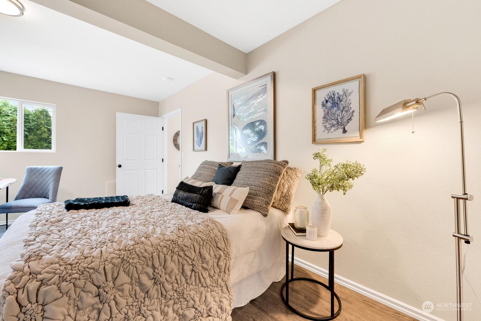 1715 16th Avenue South Seattle, WA 98144 - Photo 13 of 38 a bedroom with a bed and a potted plant