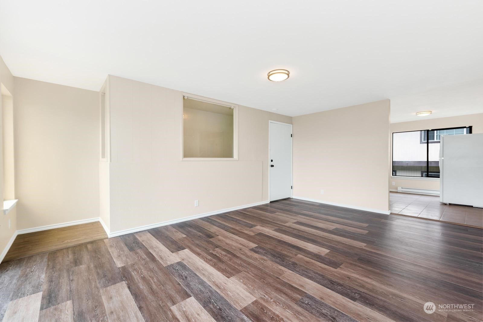 1715 16th Avenue South Seattle, WA 98144 - Photo 18 of 38 a view of empty room with wooden floor