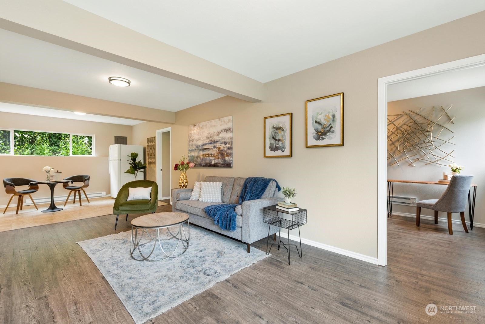 1715 16th Avenue South Seattle, WA 98144 - Photo 3 of 38 a living room with furniture and a wooden floor