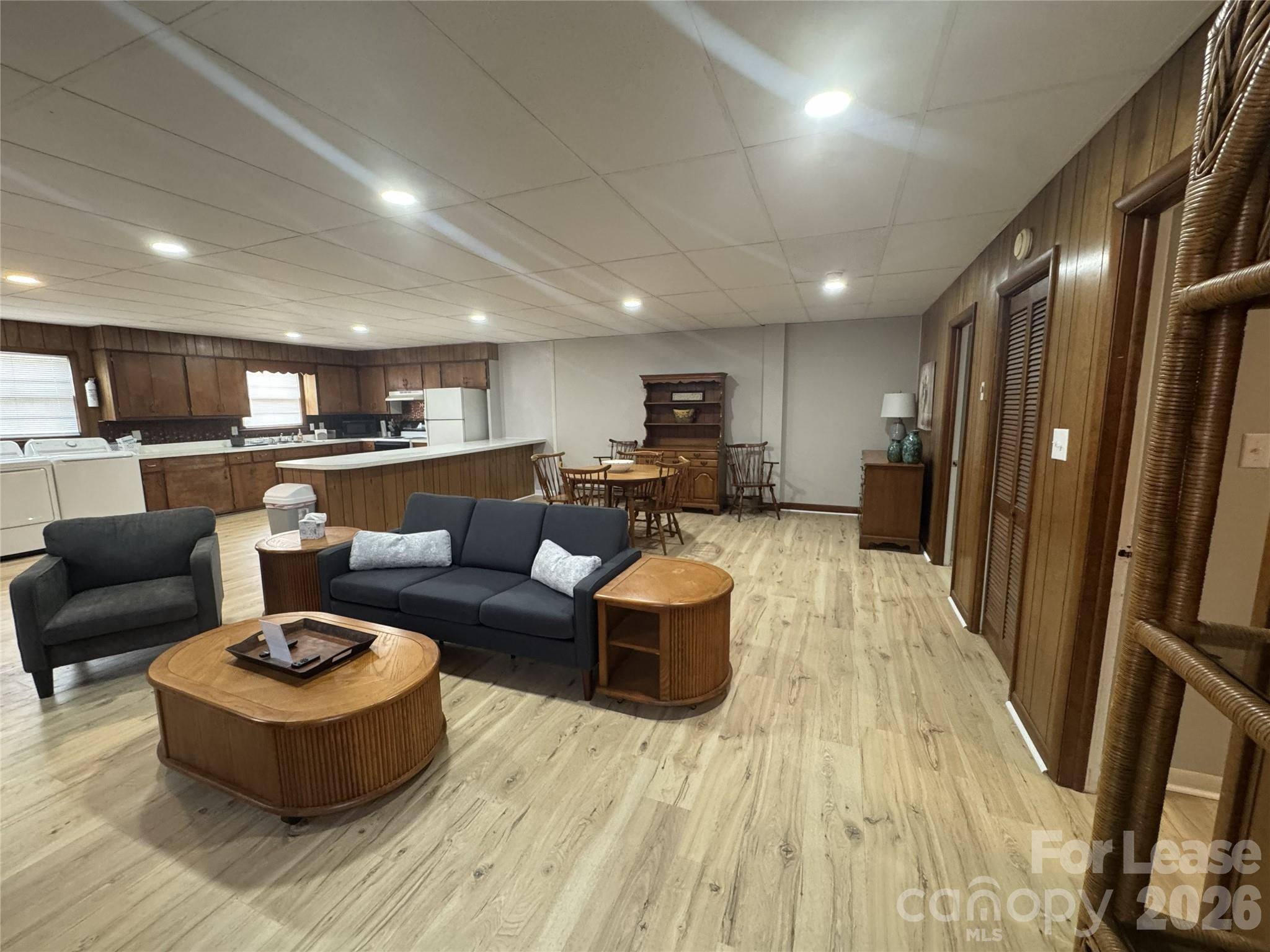 319 Connelly Springs Road, Unit A Lenoir, NC 28645 - Photo 2 of 10 a living room with furniture and a wooden floor
