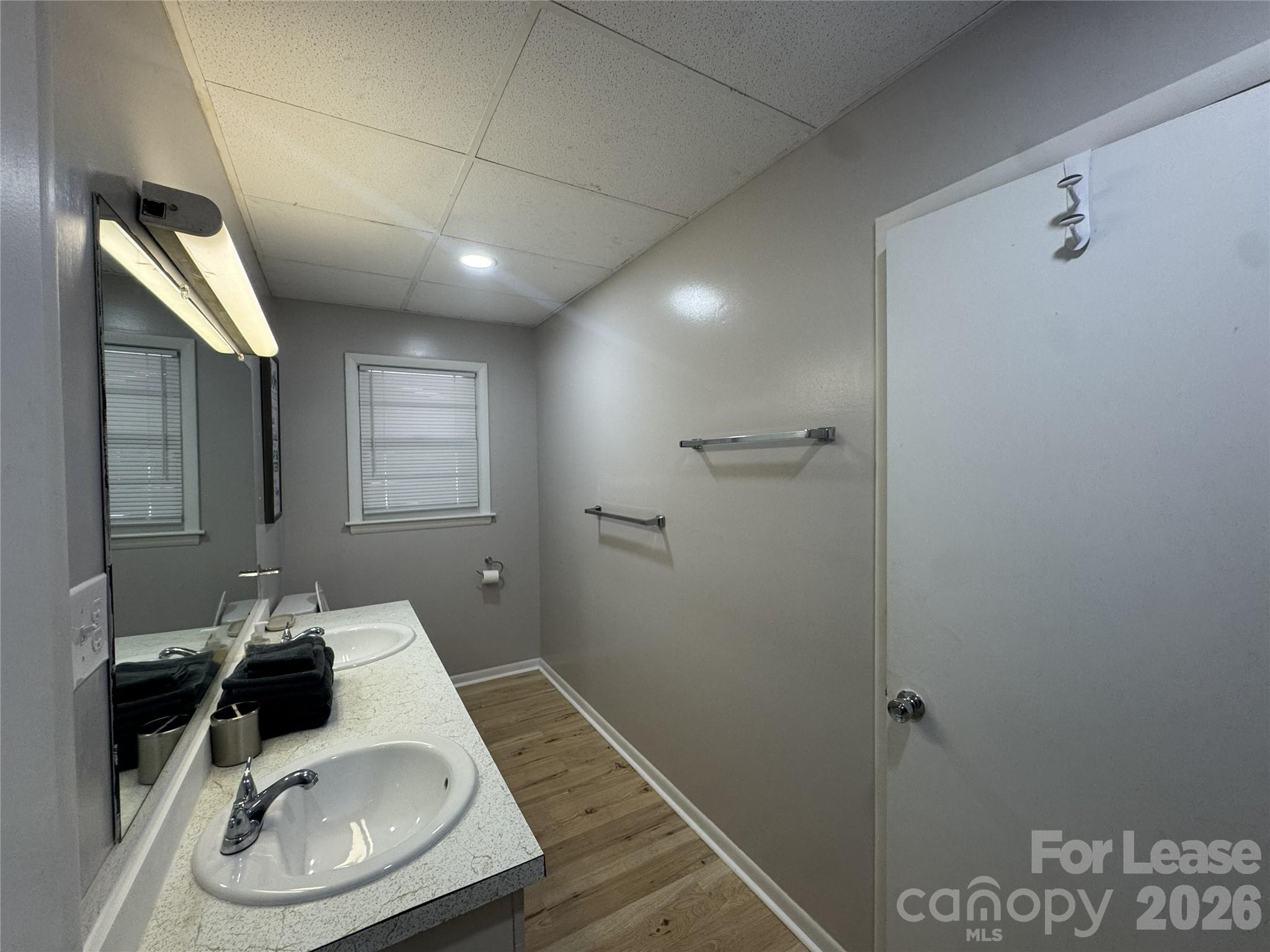 319 Connelly Springs Road, Unit A Lenoir, NC 28645 - Photo 6 of 10 a bathroom with a sink toilet and shower