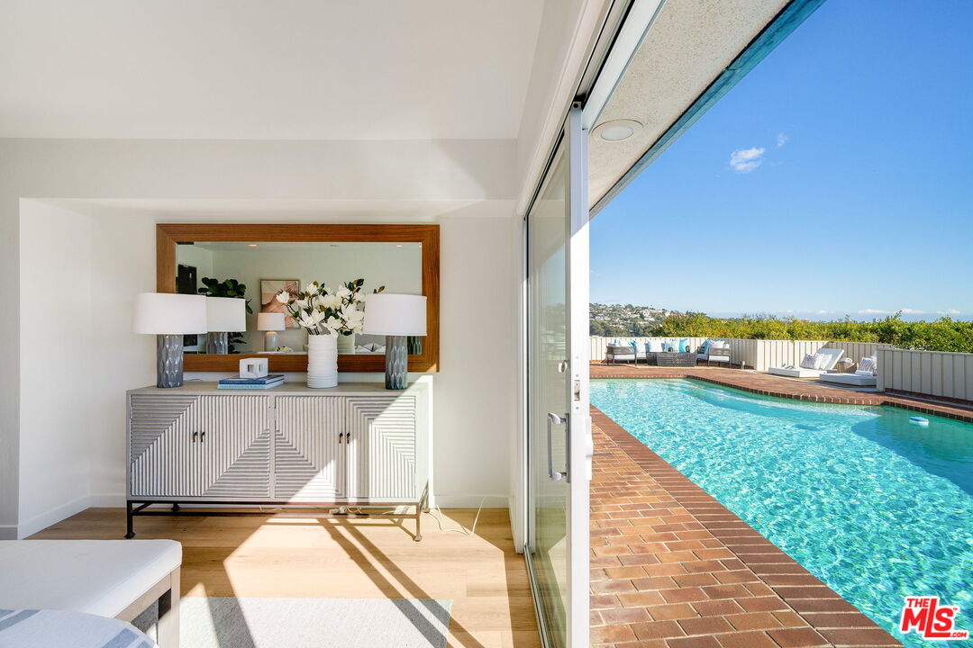 18332 Wakecrest Drive Malibu, CA 90265 - Photo 18 of 30 a living room with furniture and a garden