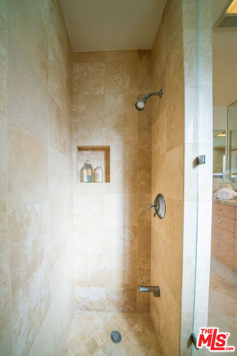 18332 Wakecrest Drive Malibu, CA 90265 - Photo 19 of 30 a bathroom with a shower and a sink