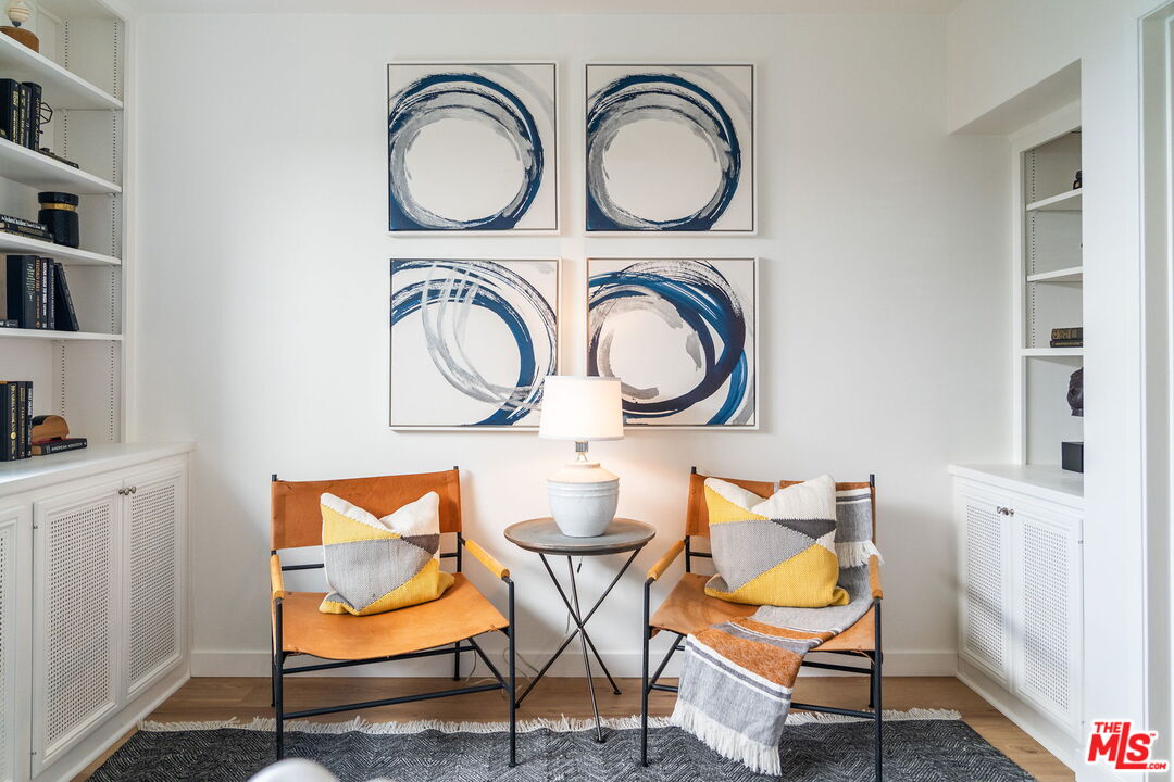 18332 Wakecrest Drive Malibu, CA 90265 - Photo 22 of 30 a group of chairs sitting in a kitchen and a sink
