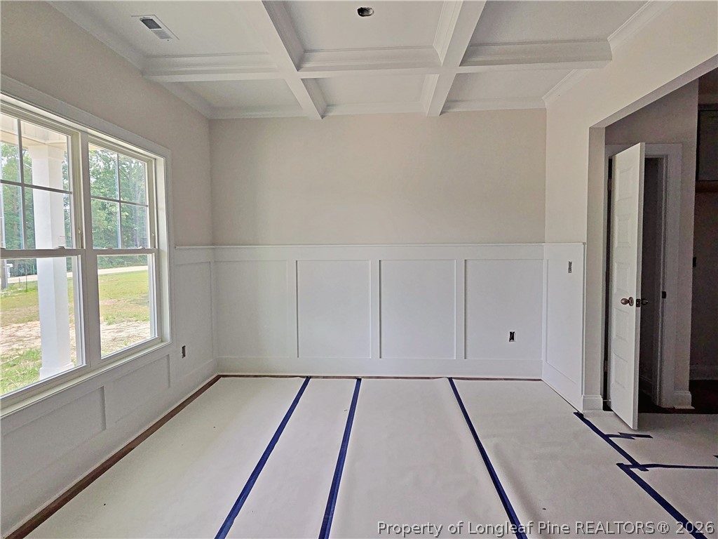 2678 Norrington Road Lillington, NC 27546 - Photo 4 of 31 a view of an empty room with a window