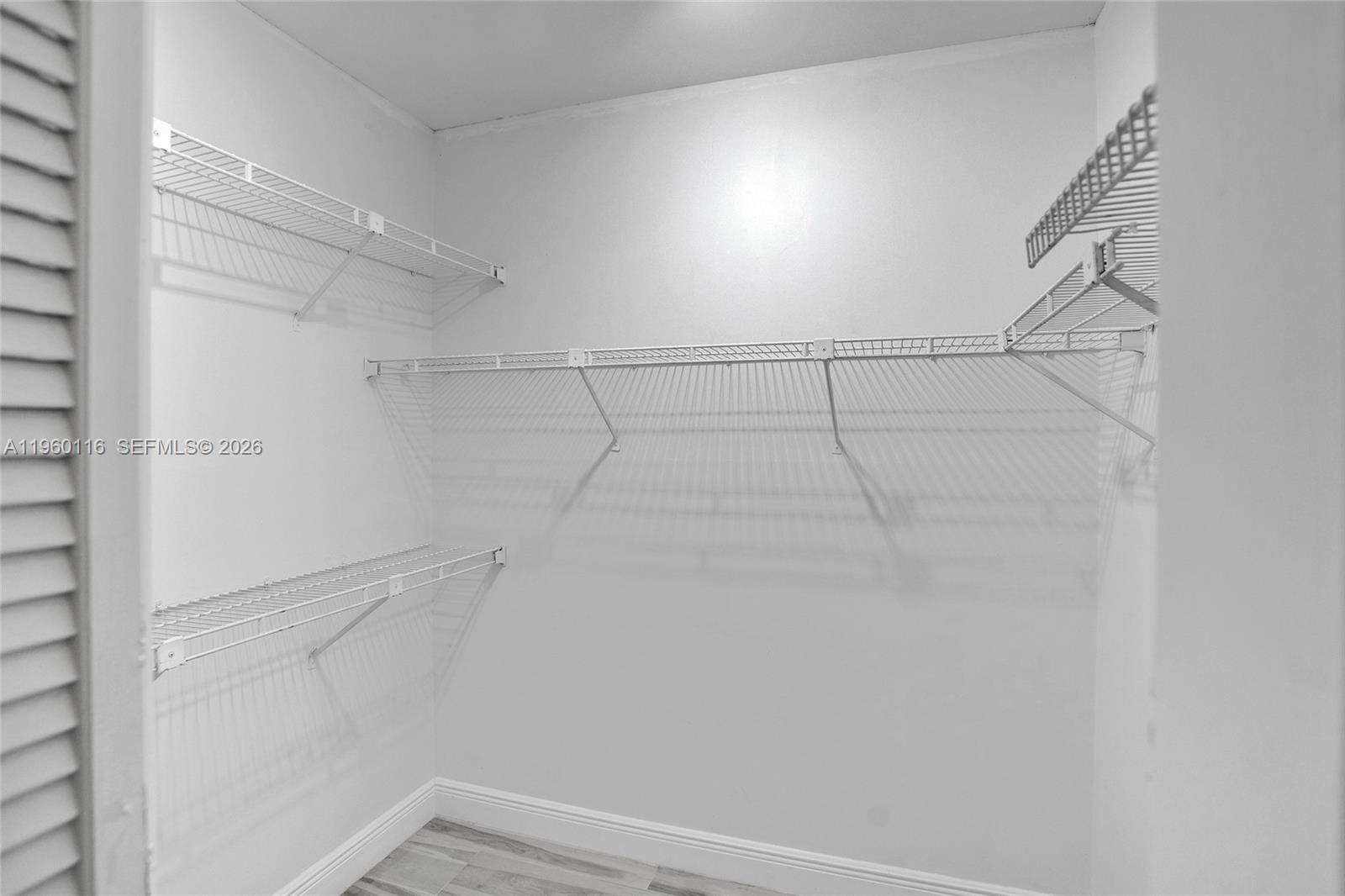 5721 Southwest 11th Street West Miami, FL 33144 - Photo 32 of 44 a view of a room with racks on the wall