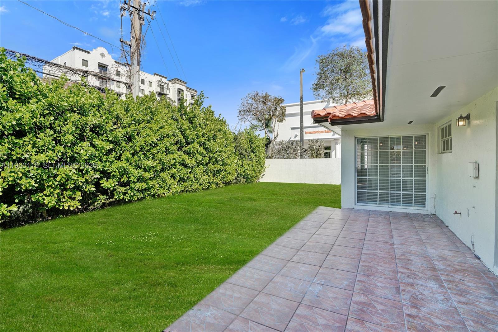 5721 Southwest 11th Street West Miami, FL 33144 - Photo 38 of 44 a view of a back yard of the house