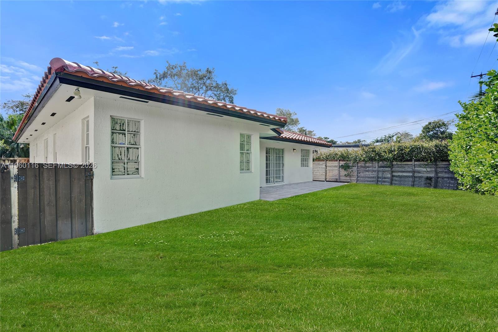 5721 Southwest 11th Street West Miami, FL 33144 - Photo 41 of 44 a view of a house with a backyard