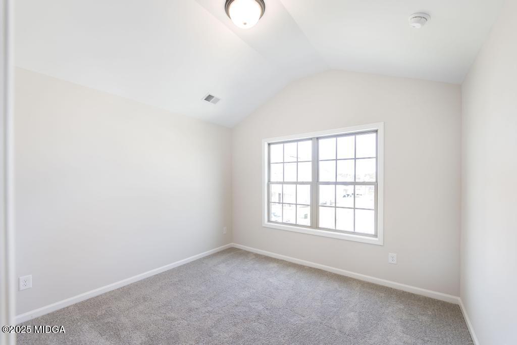 102 Black Birch Road, Unit 83G Perry, GA 31069 - Photo 17 of 31 an empty room with windows