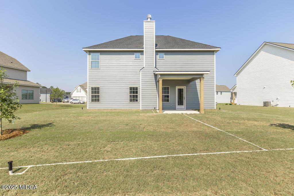 102 Black Birch Road, Unit 83G Perry, GA 31069 - Photo 31 of 31 a view of an empty room with yard and kitchen
