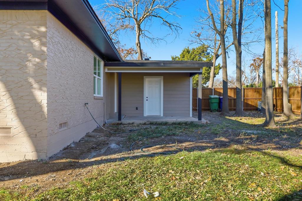 2900 Old Orchard Road Garland, TX 75041 - Photo 16 of 18 a view of a house with a yard