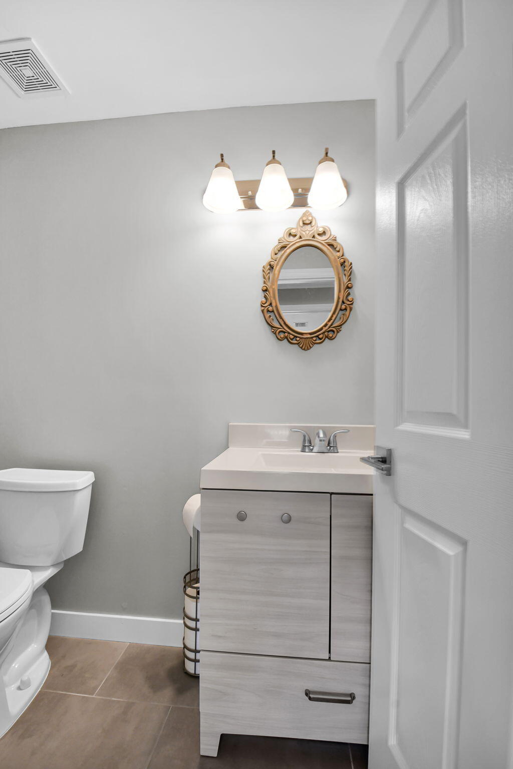 388 Tuscany Lane, Unit 388 Delray Beach, FL 33446 - Photo 21 of 89 a bathroom with a sink and a toilet