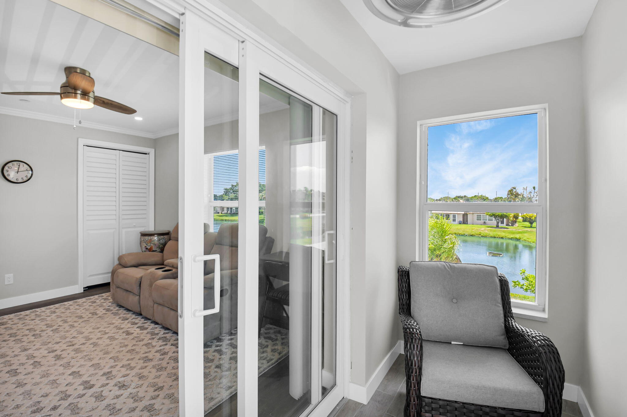 388 Tuscany Lane, Unit 388 Delray Beach, FL 33446 - Photo 32 of 89 a living room with furniture and a rug