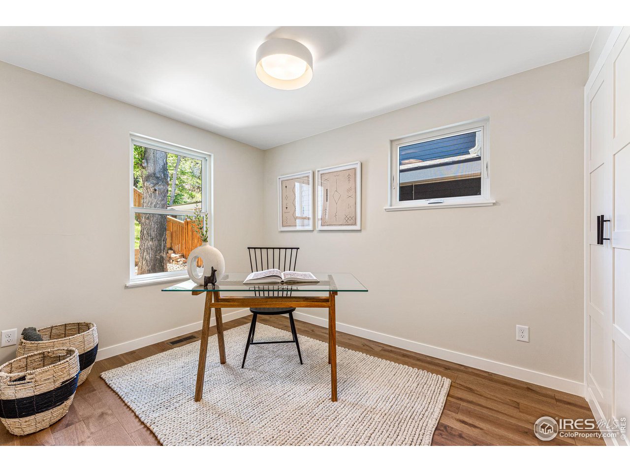 1616 North Street Boulder, CO 80304 - Photo 17 of 32 a work room with furniture and a window