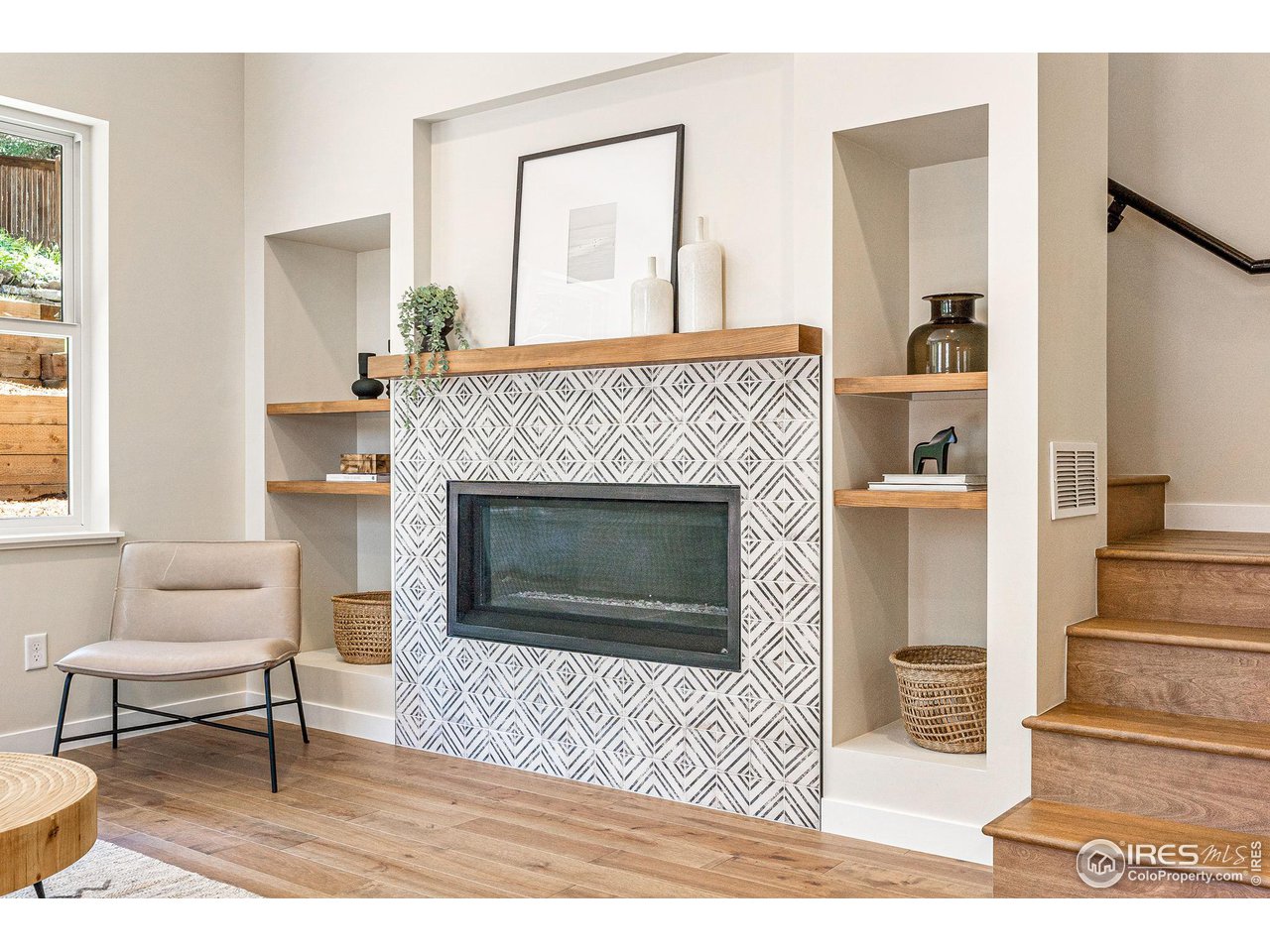 1616 North Street Boulder, CO 80304 - Photo 23 of 32 a living room with furniture and a fireplace