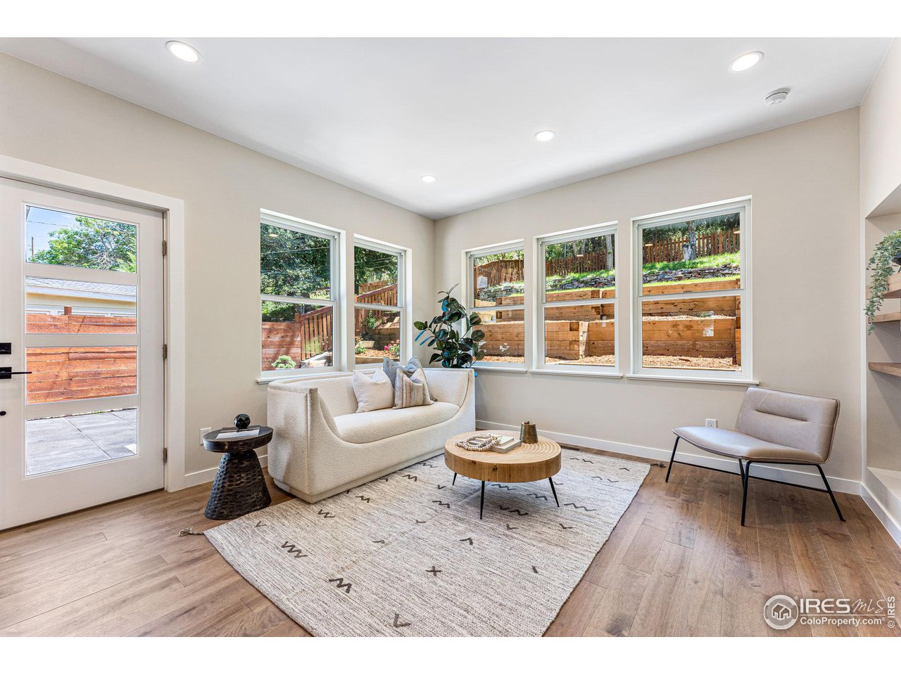 1616 North Street Boulder, CO 80304 - Photo 24 of 32 a living room with furniture and a window