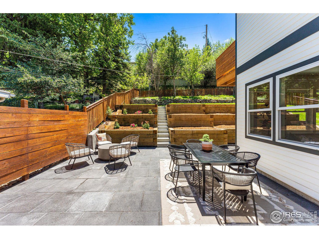 1616 North Street Boulder, CO 80304 - Photo 27 of 32 a view of a chairs and table in patio