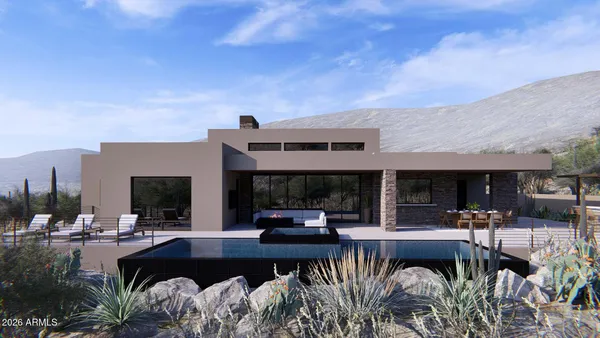 a view of a swimming pool and couches in patio