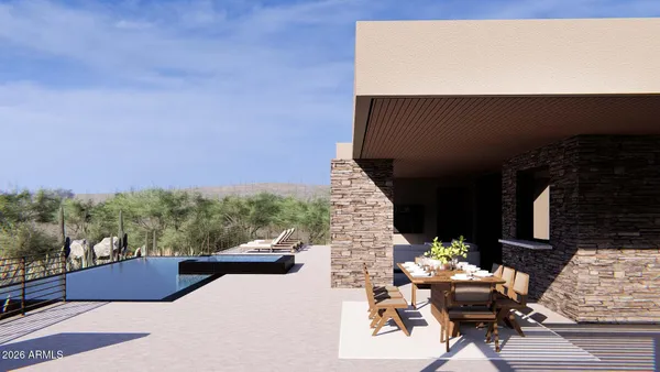 a view of a patio with chairs and a table