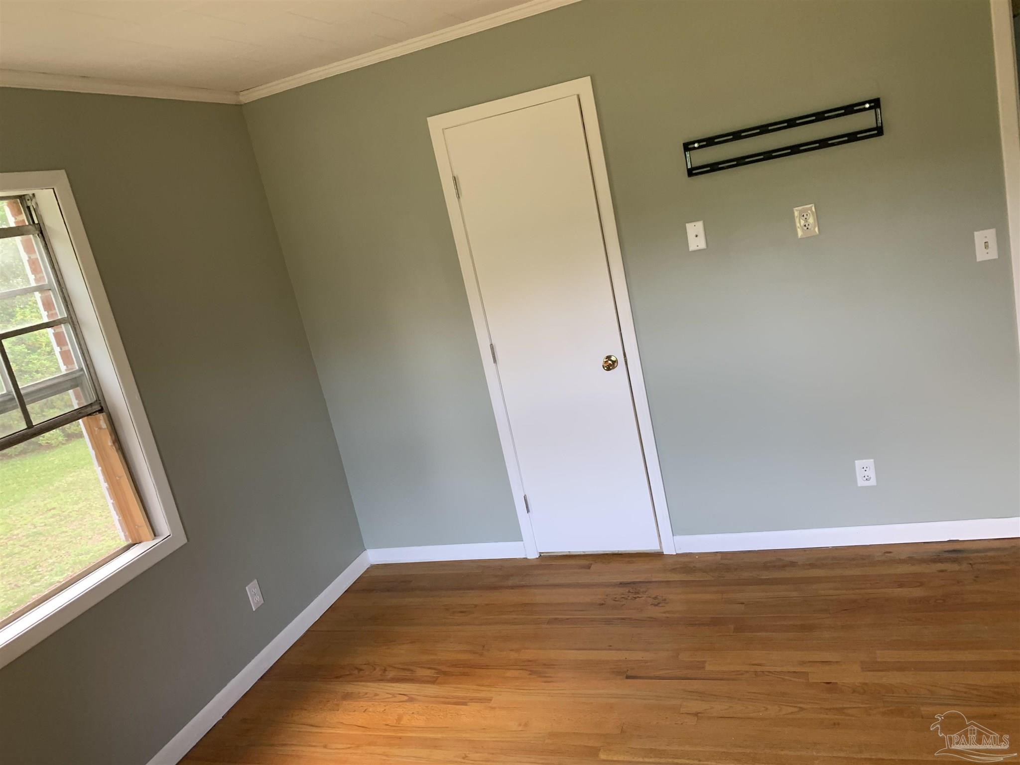 887 Old Bratt Road Atmore, AL 36502 - Photo 12 of 41 a view of empty room with window