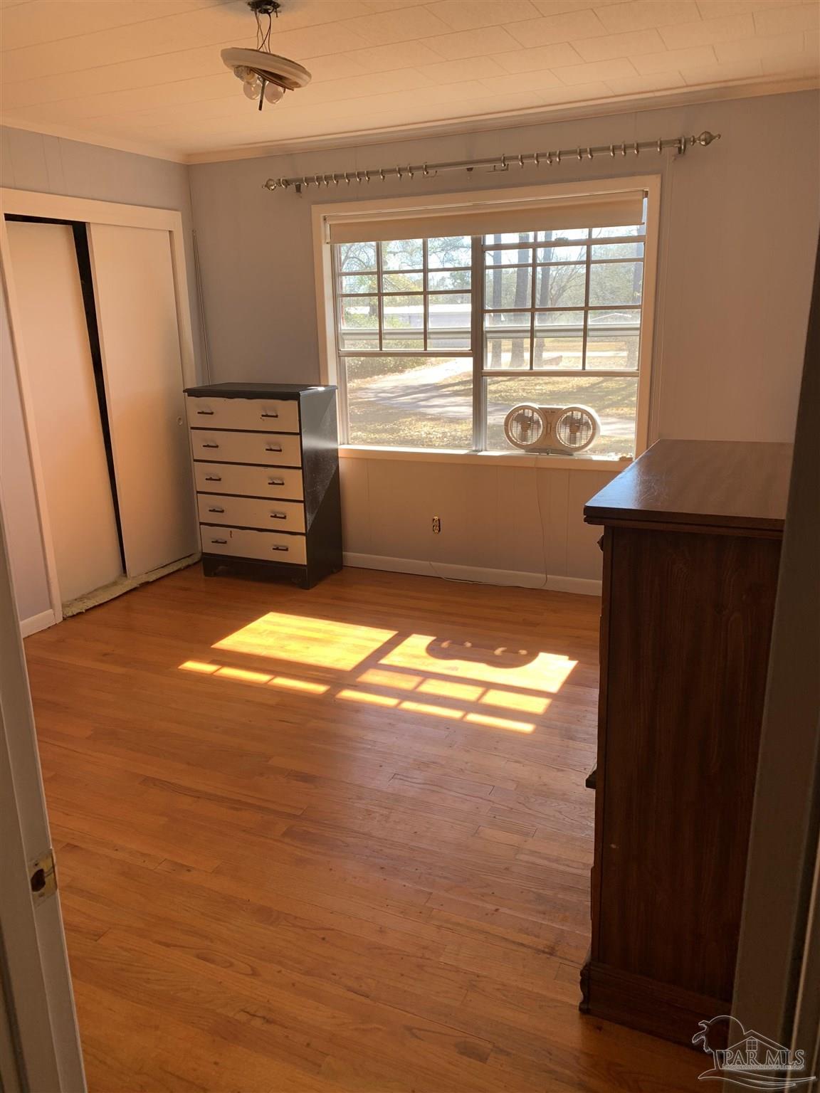 887 Old Bratt Road Atmore, AL 36502 - Photo 6 of 41 a view of an empty room with a window