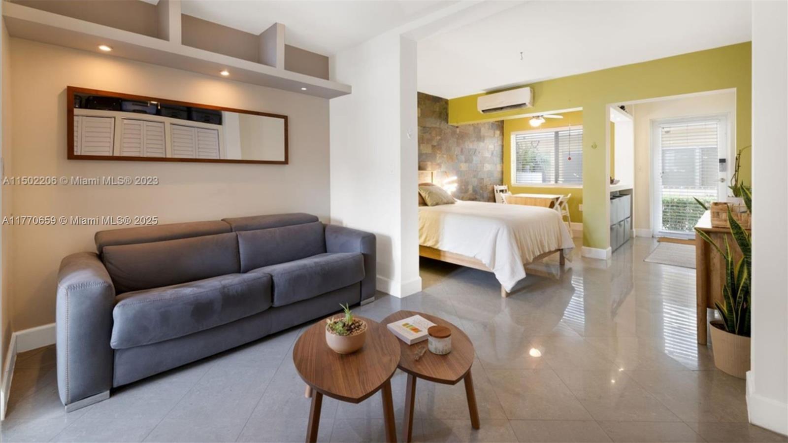 Flamingo-Lummus Miami Beach, FL 33139 - Photo 1 of 19 a living room with furniture and a flat screen tv