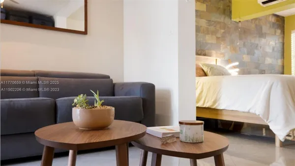 a living room with furniture and a couch